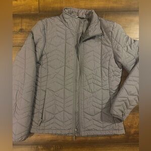 Women’s North Face jacket. Fitted size medium. Gray